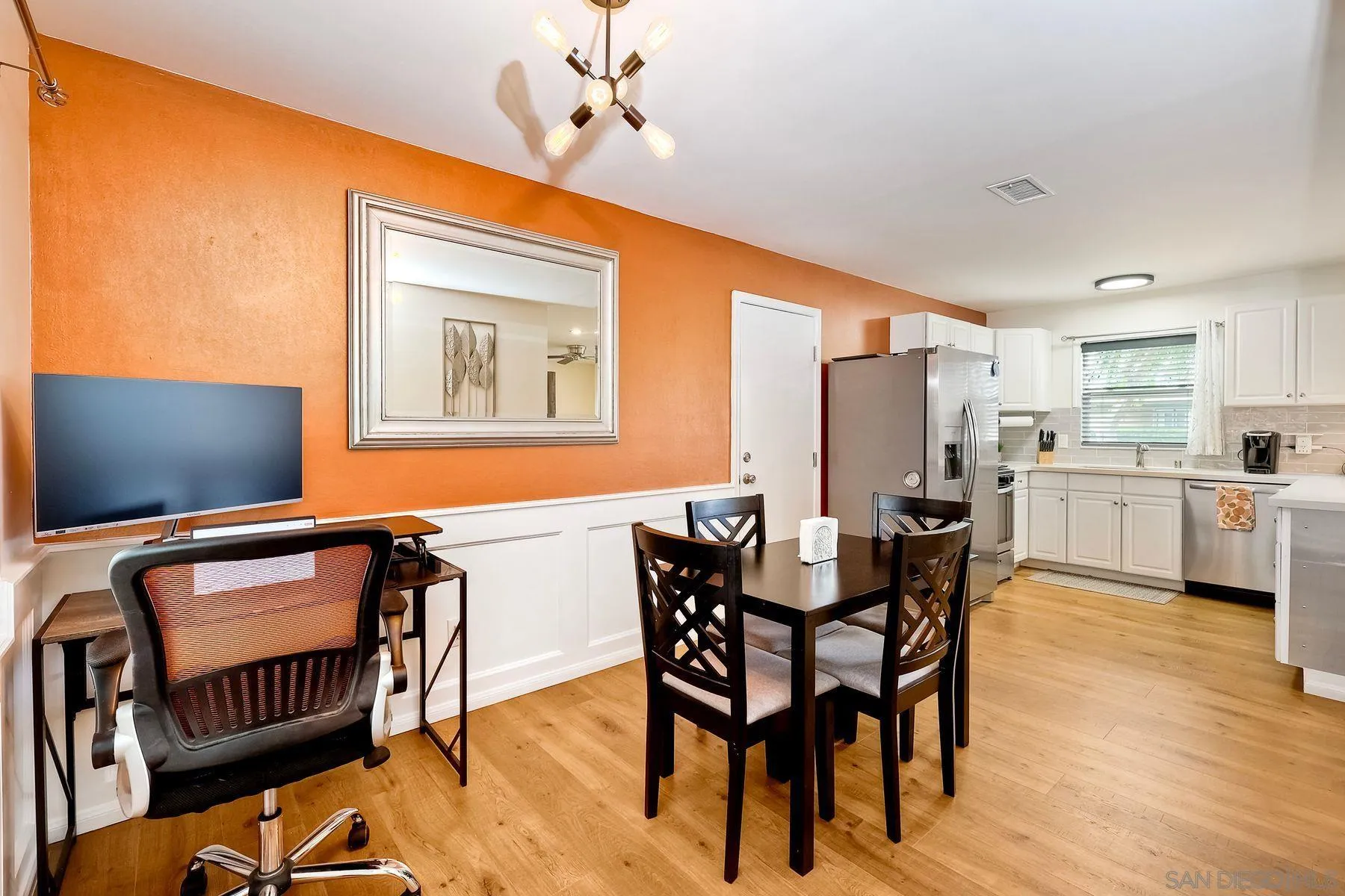 9410 Pike Road Santee, CA 92071 - Photo 14 of 25 a view of a dining room with furniture and wooden floor