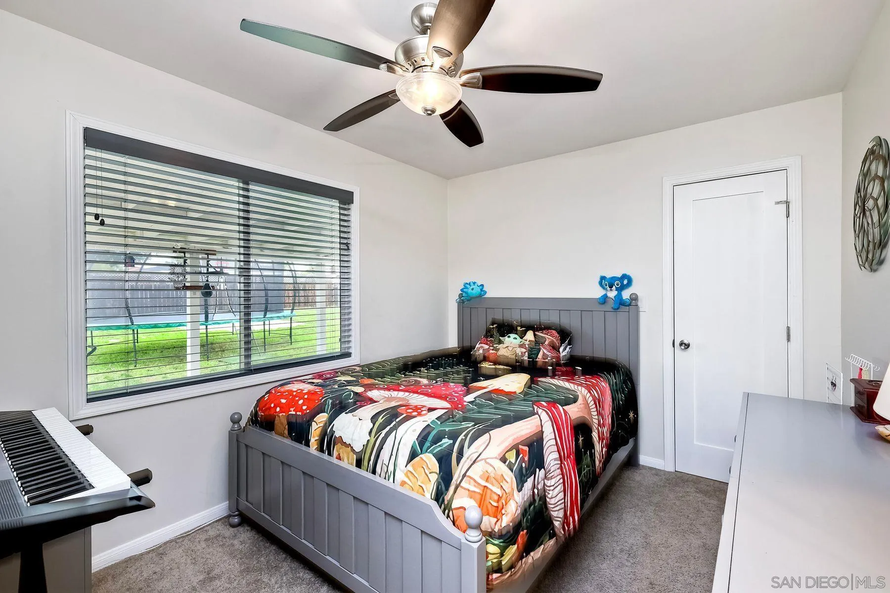 9410 Pike Road Santee, CA 92071 - Photo 20 of 25 a bedroom with a bed and a window