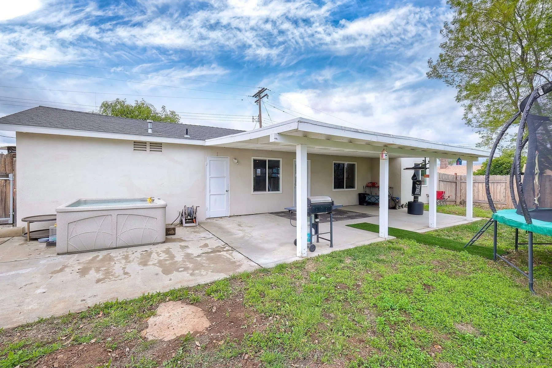 9410 Pike Road Santee, CA 92071 - Photo 24 of 25 a backyard of a house with table and chairs