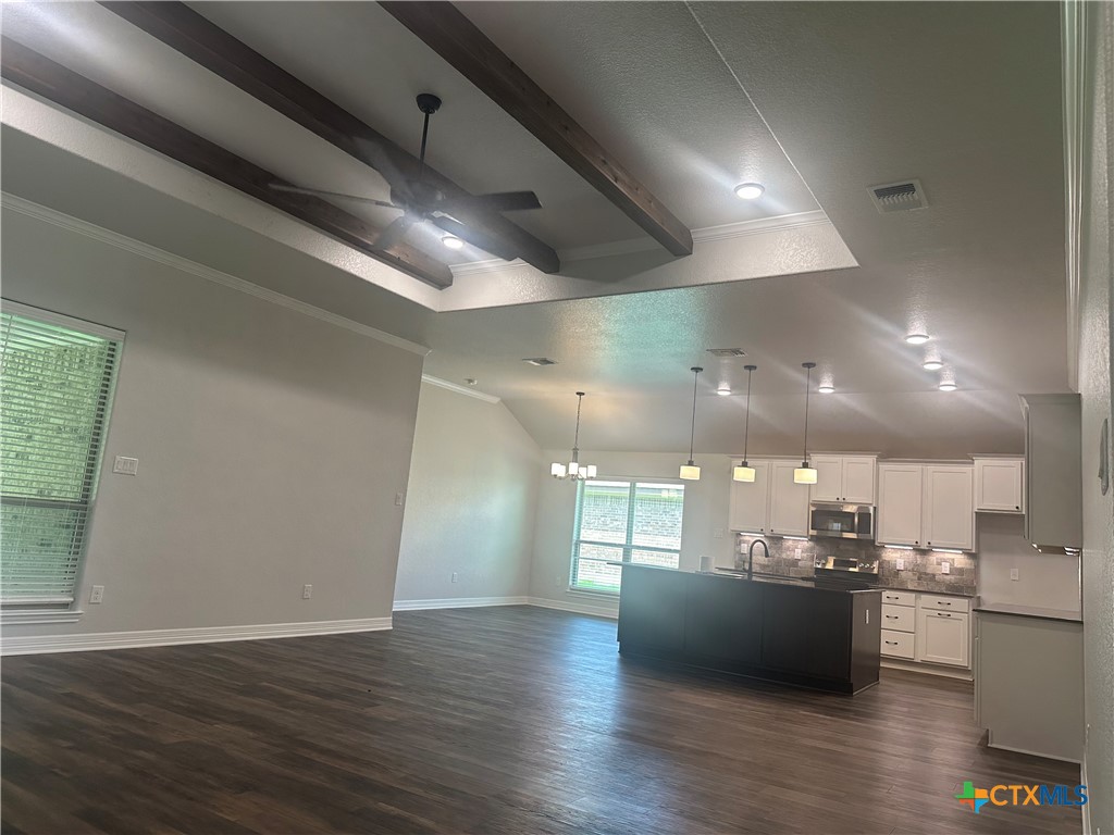 2005 Edna Lane Troy, TX 76579 - Photo 3 of 30 a view of a living room and kitchen with wooden floor