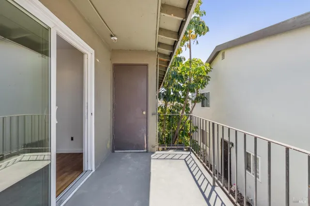 a view of a house with a flower garden