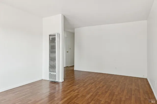 a bathroom with a sink toilet vanity and shower