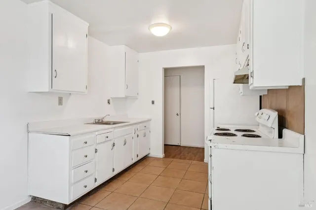 a car parked in front of a house