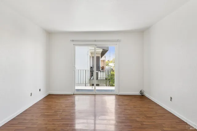 a bedroom with a bed and a walk in closet