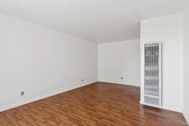 a bathroom with a sink a toilet and shower curtain