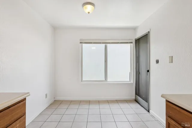 a house with trees in the background