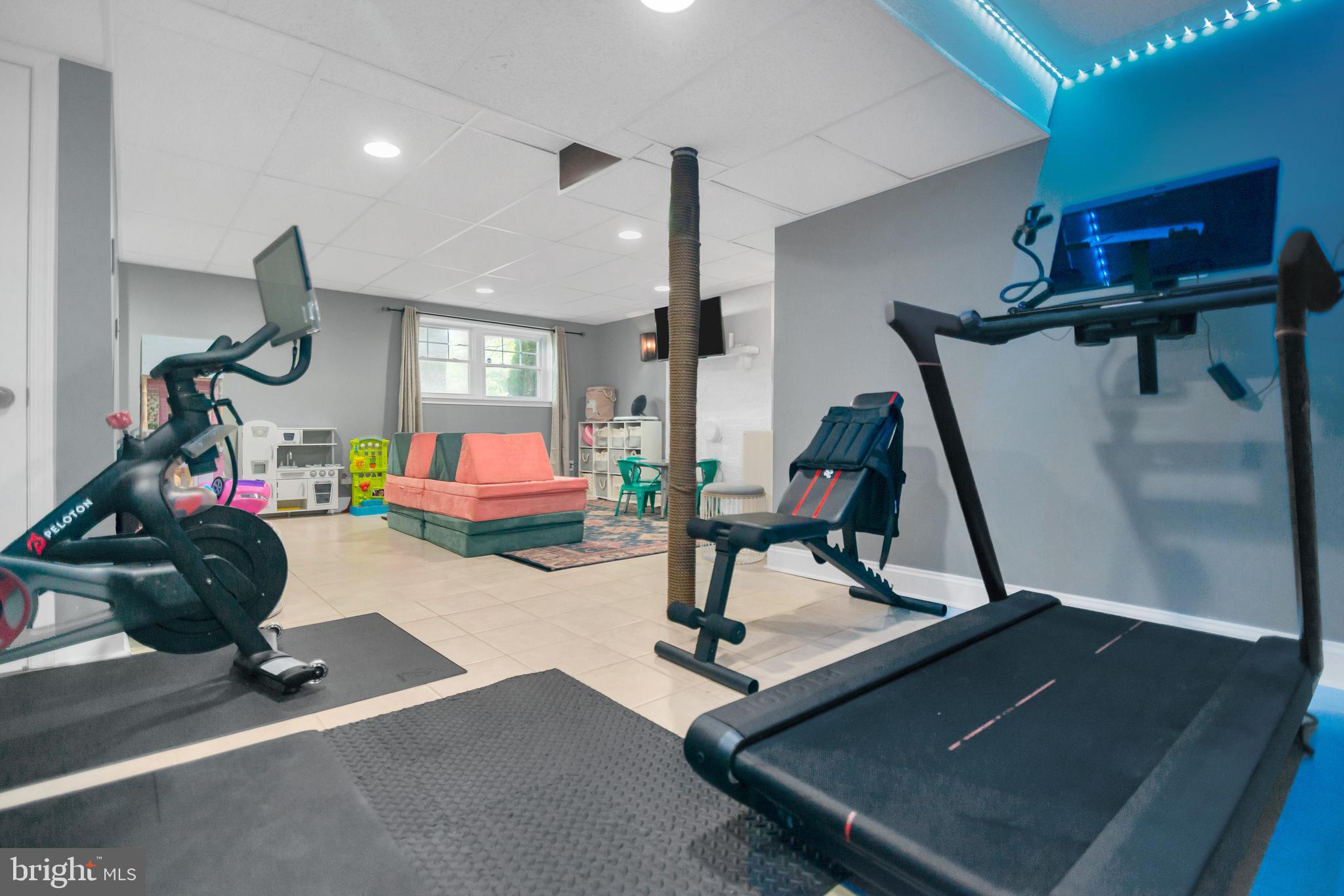 5625 Selford Road Halethorpe, MD 21227 - Photo 38 of 52 a room with gym equipment and windows