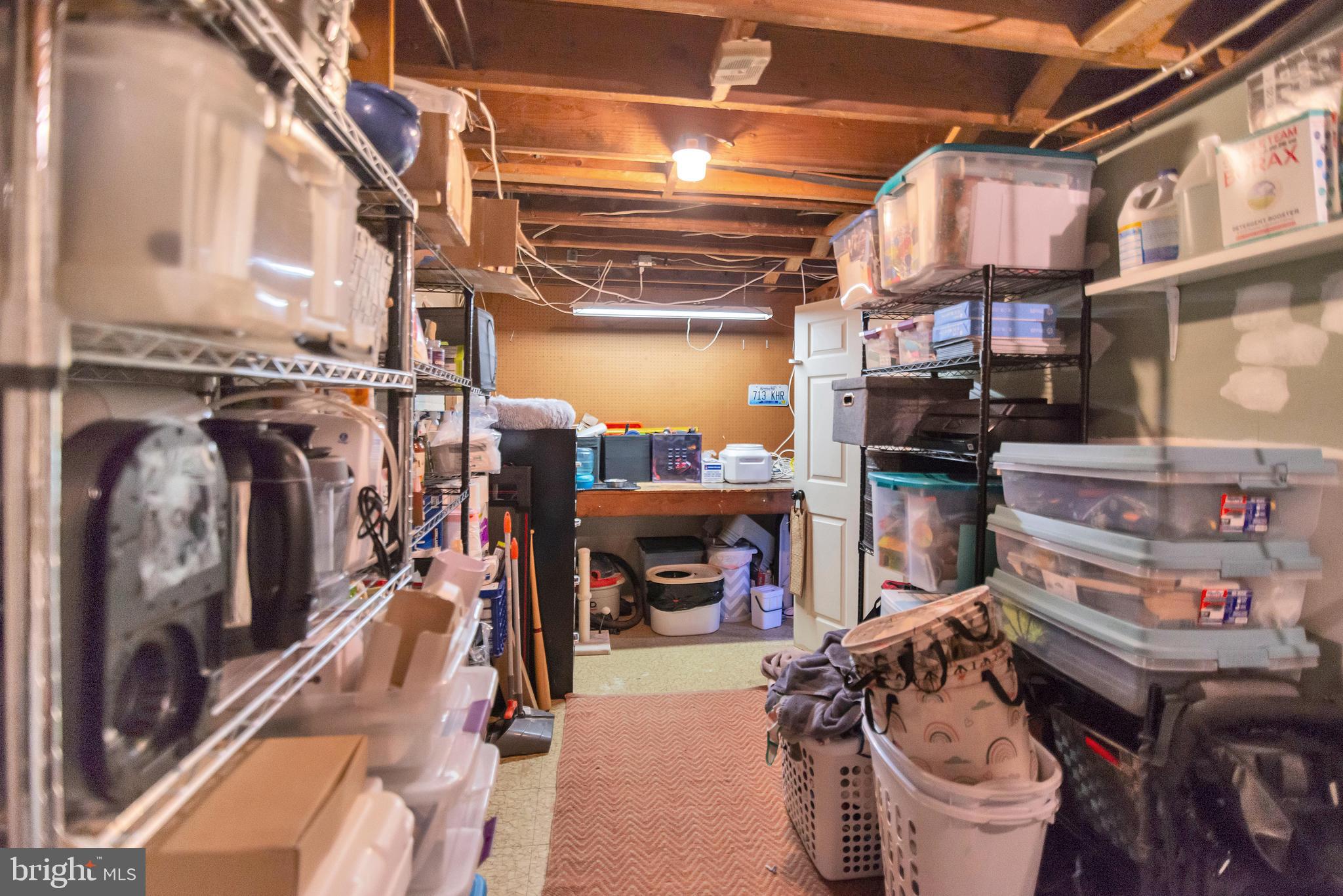 5625 Selford Road Halethorpe, MD 21227 - Photo 45 of 52 a room with lots of different colored cloths