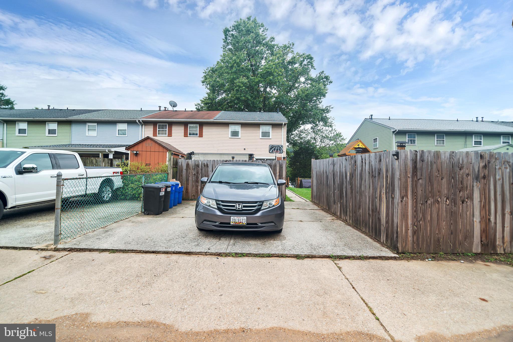 5625 Selford Road Halethorpe, MD 21227 - Photo 7 of 52 a car parked in front of a building