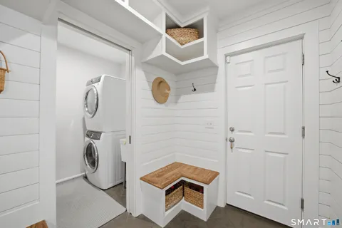 a room with wooden door and shower