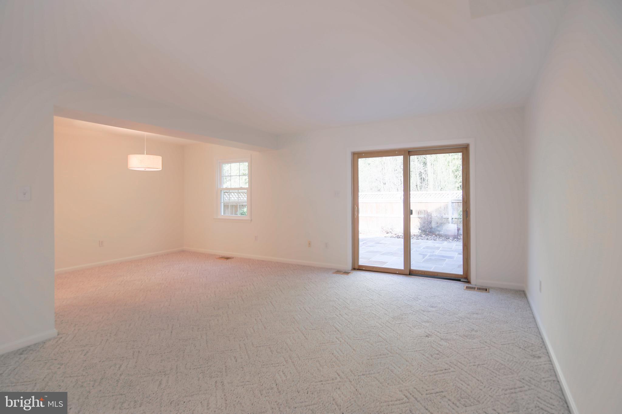9738 Cardinal Road Fairfax, VA 22030 - Photo 18 of 63 Updated Sliding Doors Lead to Private Garden