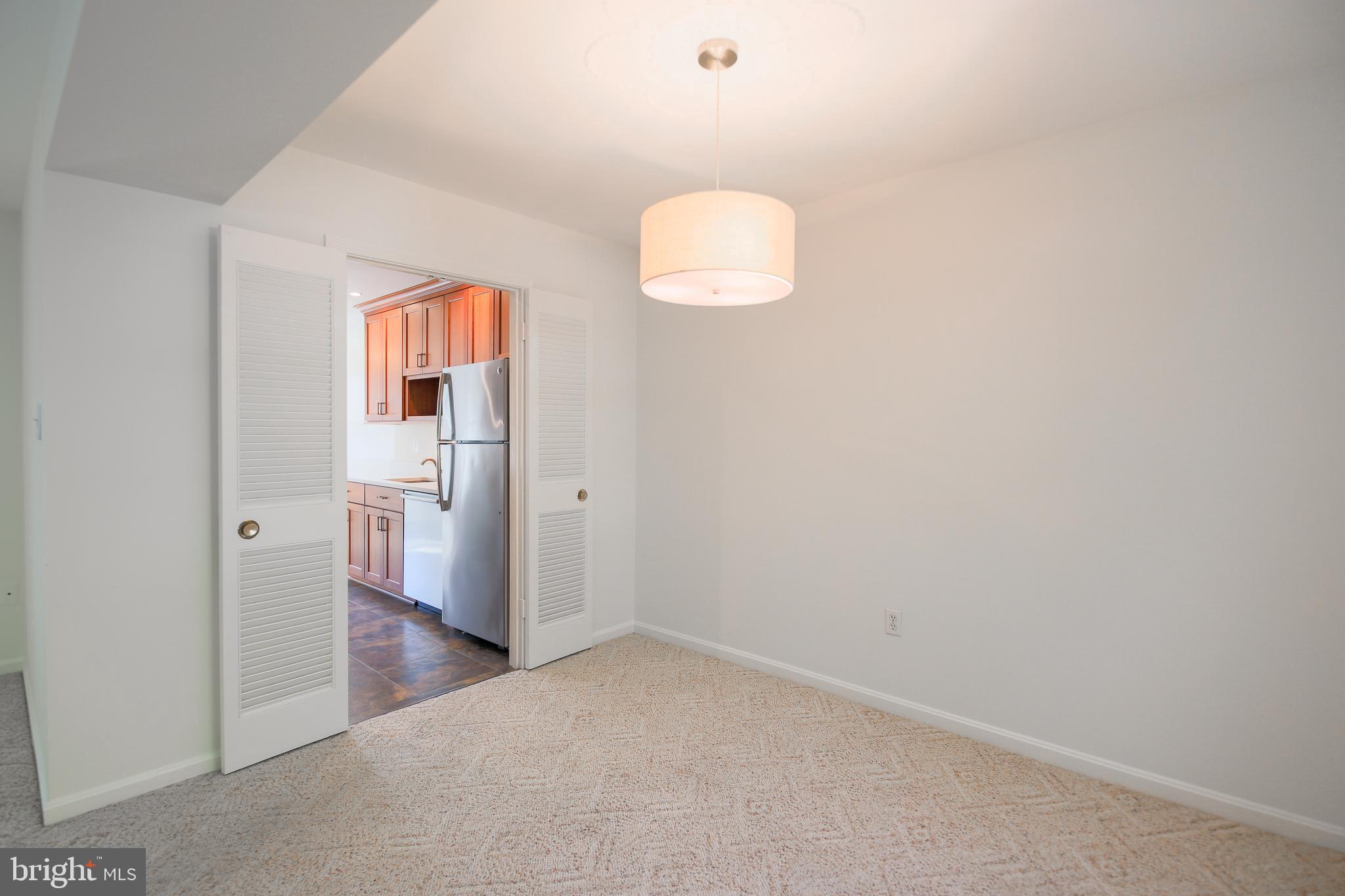 9738 Cardinal Road Fairfax, VA 22030 - Photo 22 of 63 Dining Room Located Off the Kitchen