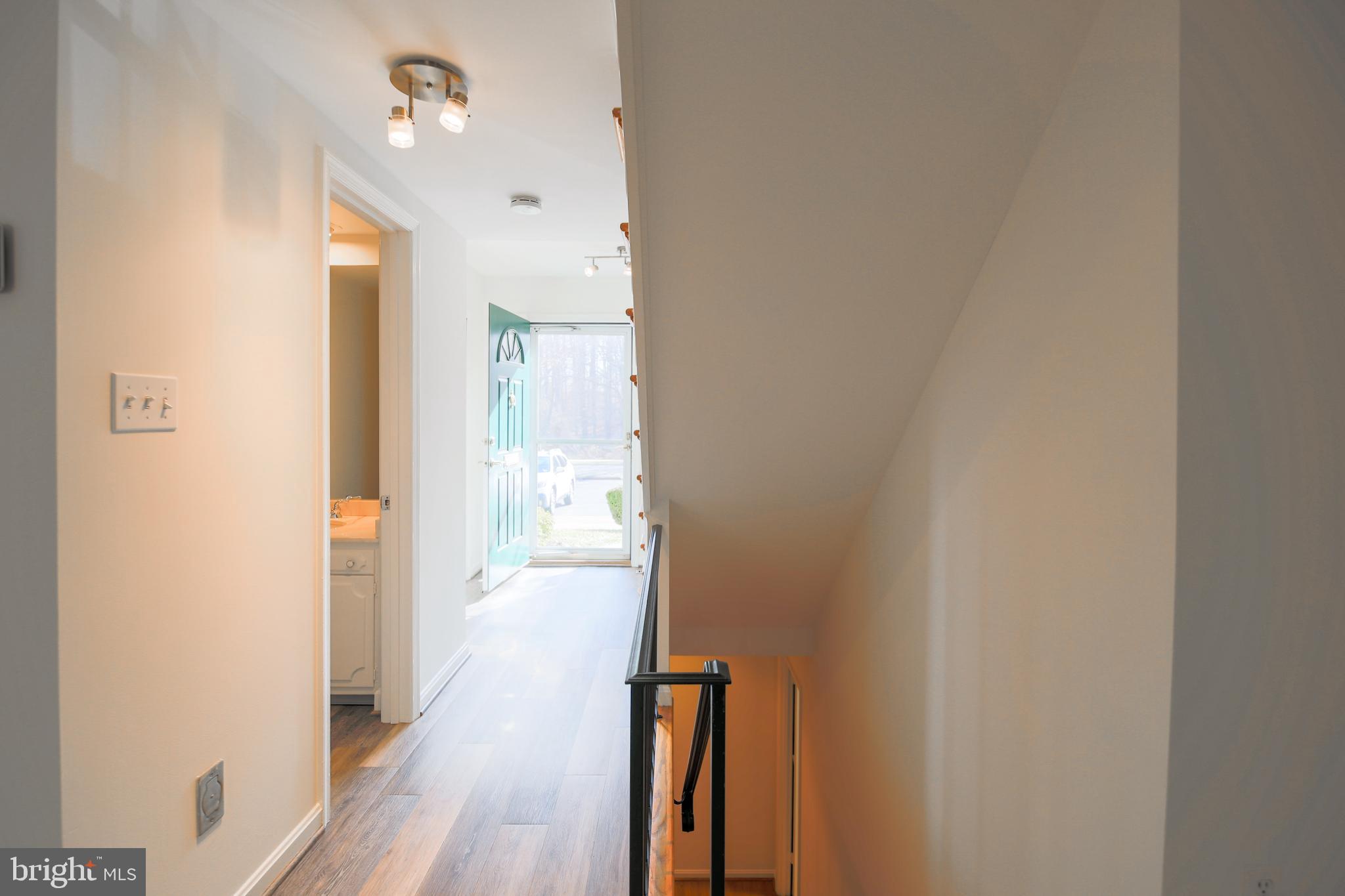 9738 Cardinal Road Fairfax, VA 22030 - Photo 28 of 63 Front Hallway & Powder Room