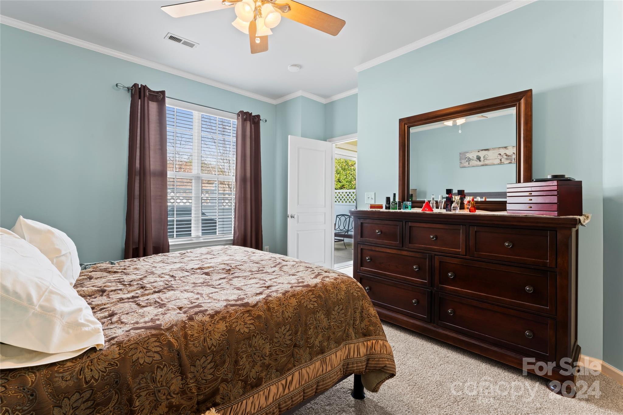 806 Gentlewinds Court Fort Mill, SC 29708 - Photo 32 of 37 a bedroom with a bed and a dresser