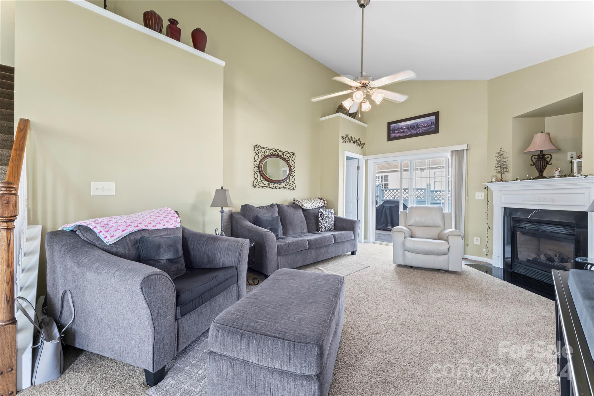 806 Gentlewinds Court Fort Mill, SC 29708 - Photo 8 of 37 a living room with furniture and a fireplace