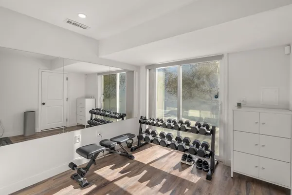 a bathroom with a shower and sink