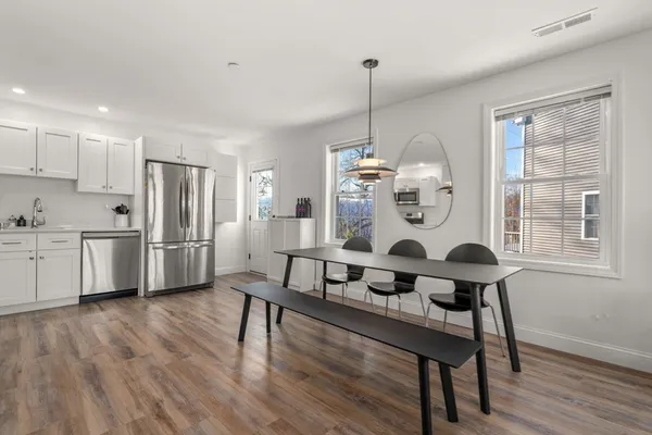 a bed room with a bed and a window