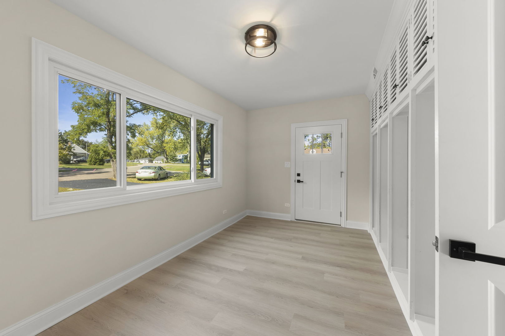 1280 Brandywine Circle Batavia, IL 60510 - Photo 13 of 36 a view of an empty room with a window