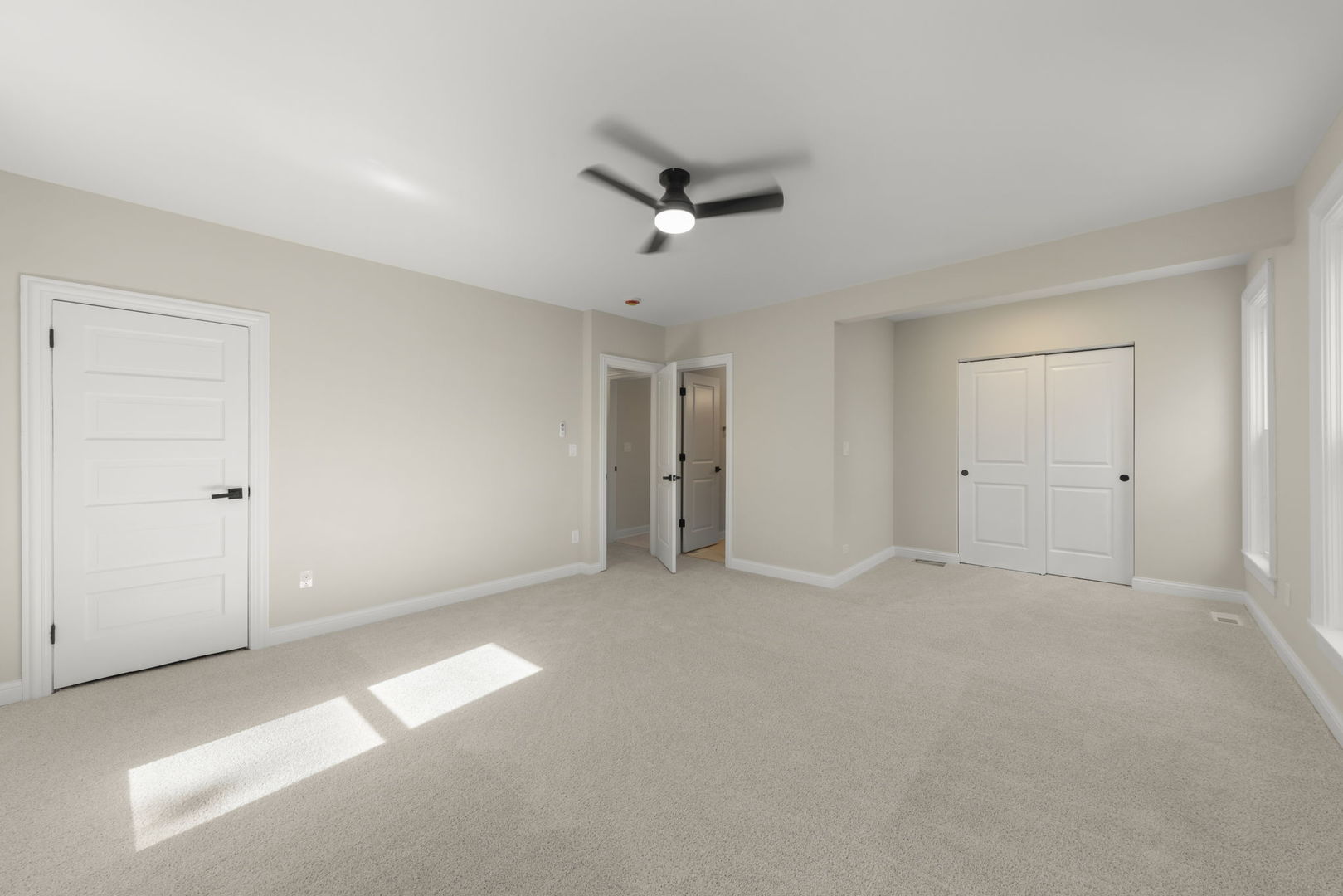 1280 Brandywine Circle Batavia, IL 60510 - Photo 17 of 36 a view of an empty room with a ceiling fan