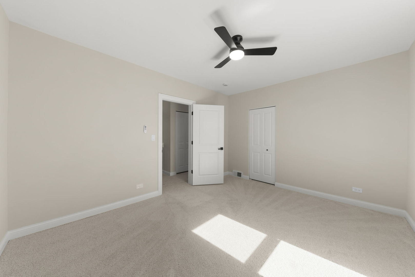 1280 Brandywine Circle Batavia, IL 60510 - Photo 20 of 36 an empty room with a ceiling fan and window