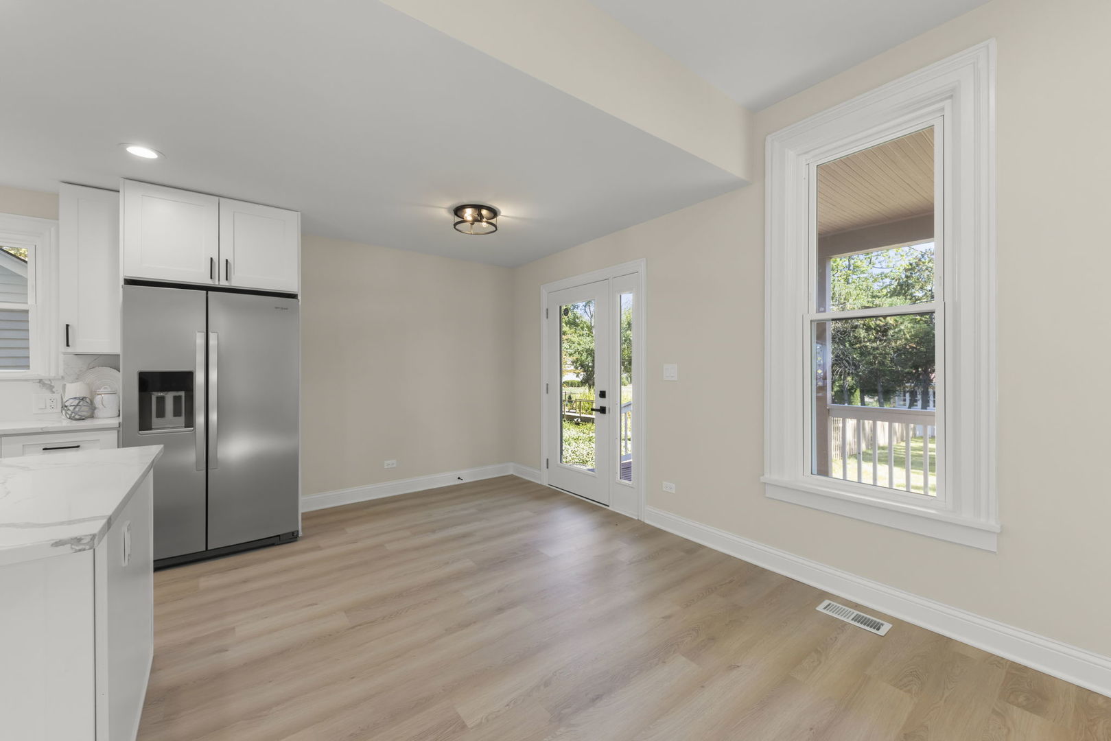 1280 Brandywine Circle Batavia, IL 60510 - Photo 7 of 36 a view of an empty room with a window