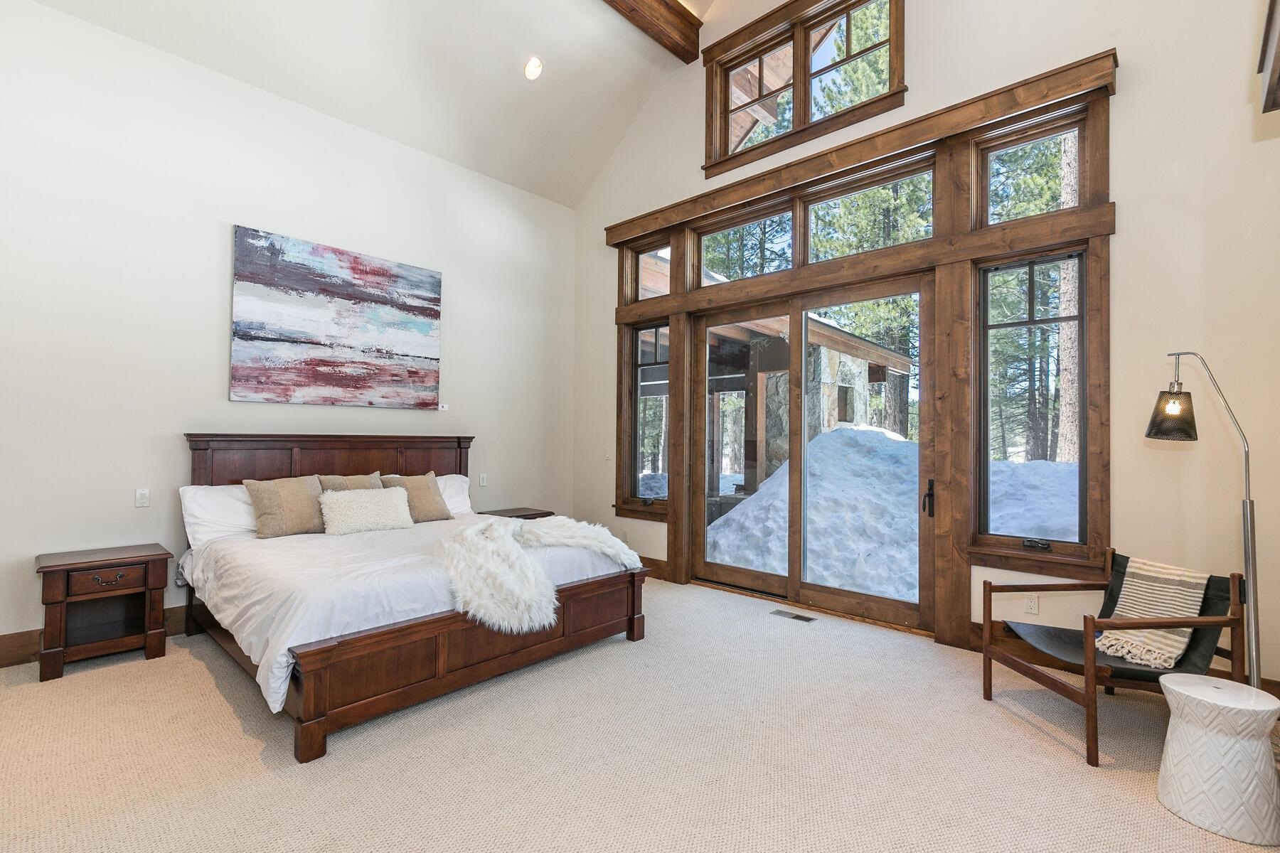 11478 Henness Road Truckee, CA 96161 - Photo 8 of 21 a bedroom with a bed and a large window