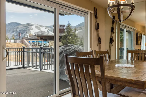 a view of a balcony with chairs
