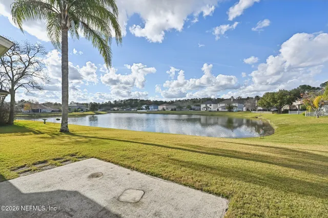 a view of a house with a swimming pool