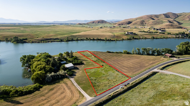 1 See Directions Preston, ID 83263 - Photo 1 of 1 Aerial view of sparsely populated area with property boundaries highlighted and a water and mountain view