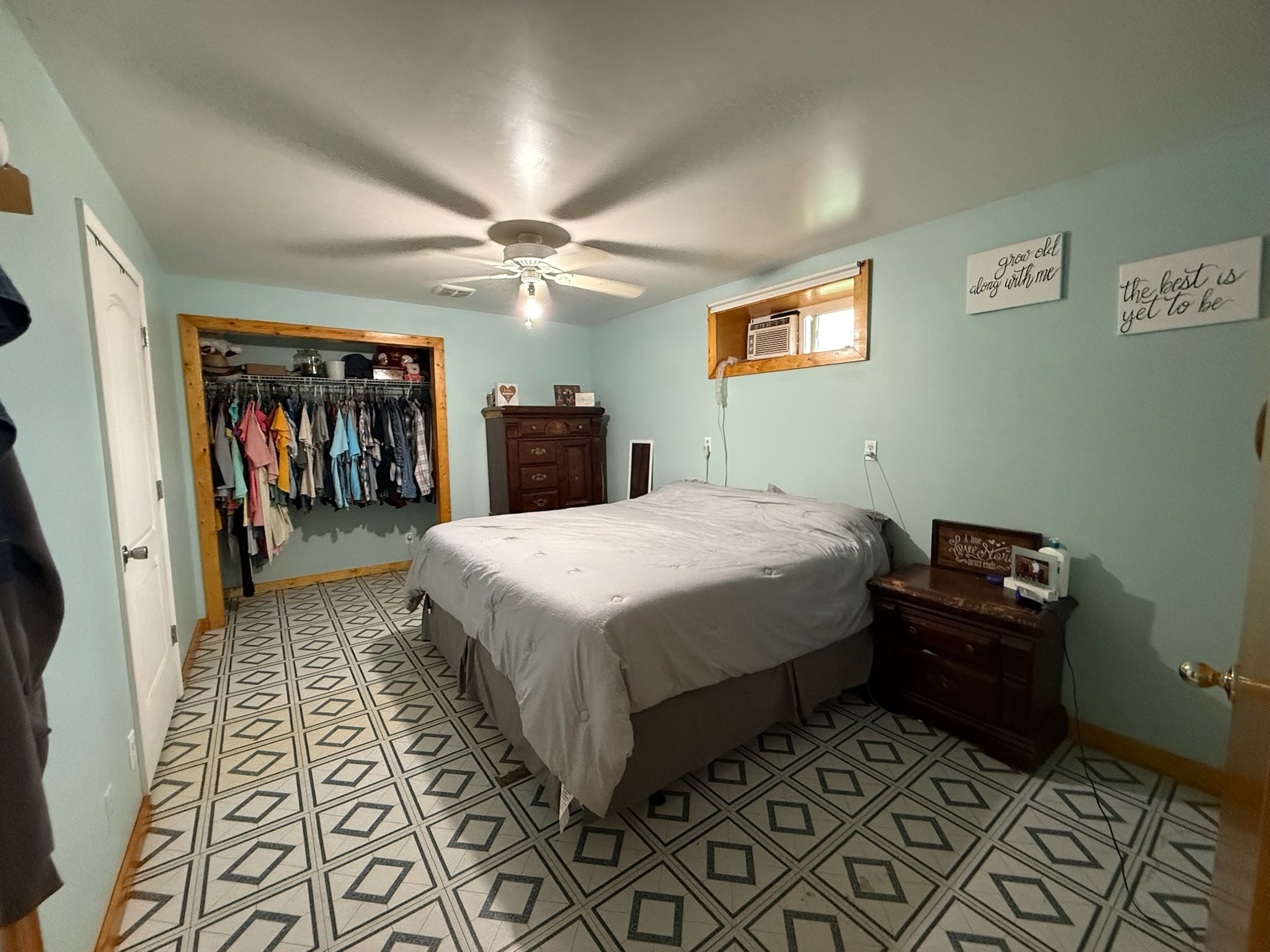 2975 Bethlehem Church Road Mount Hermon, KY 42157 - Photo 12 of 72 a bedroom with a bed and a chandelier