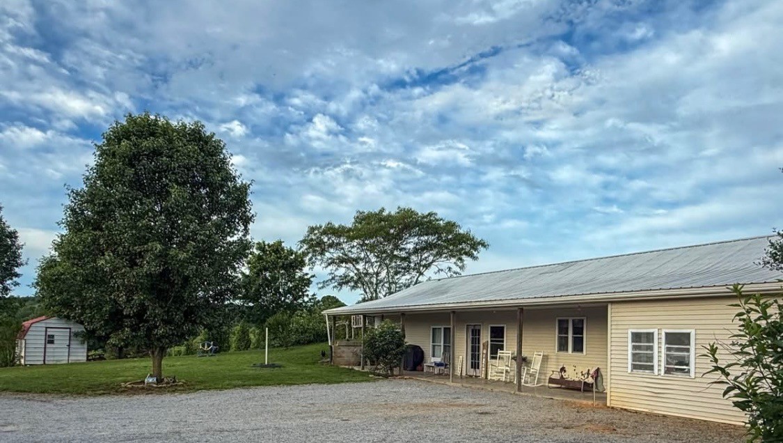 2975 Bethlehem Church Road Mount Hermon, KY 42157 - Photo 2 of 72 a front view of a house with garden