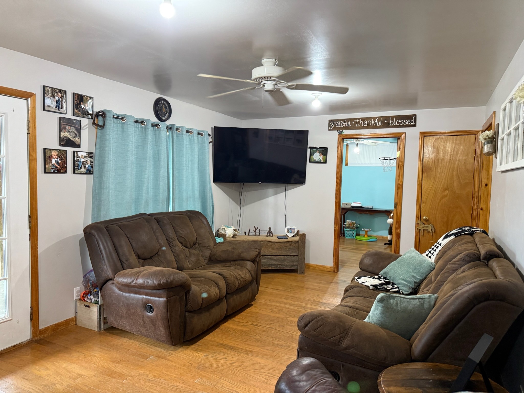 2975 Bethlehem Church Road Mount Hermon, KY 42157 - Photo 27 of 72 a living room with furniture and a flat screen tv