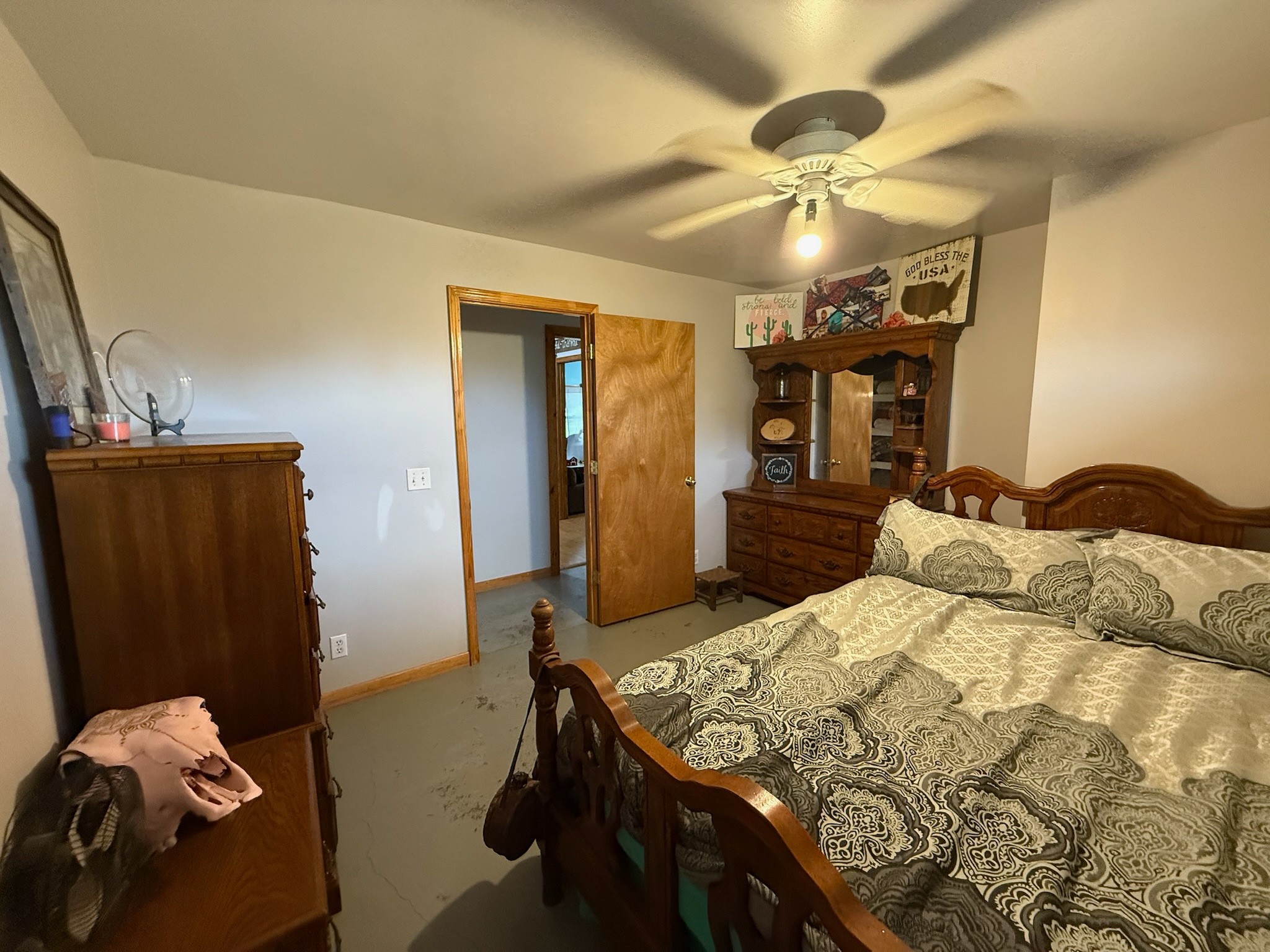 2975 Bethlehem Church Road Mount Hermon, KY 42157 - Photo 36 of 72 a bedroom with a bed and a chandelier