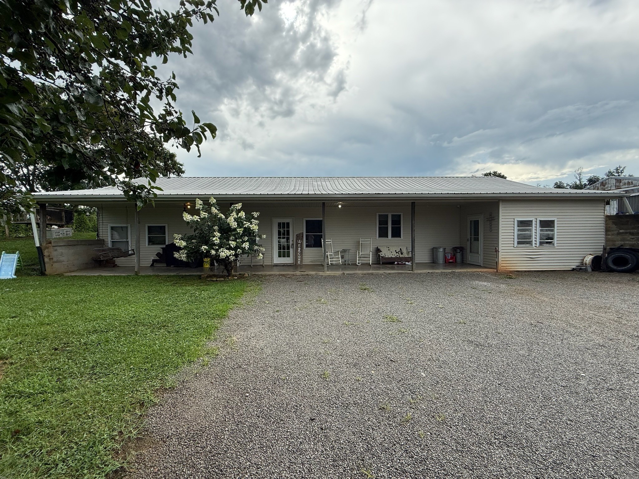 2975 Bethlehem Church Road Mount Hermon, KY 42157 - Photo 40 of 72 a view of a house with backyard and porch