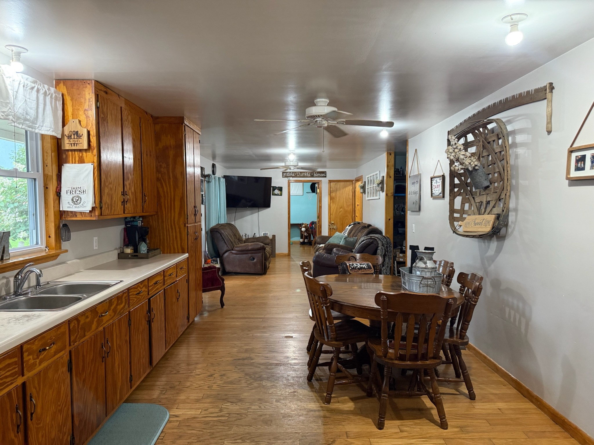 2975 Bethlehem Church Road Mount Hermon, KY 42157 - Photo 6 of 72 a view of a dining room with furniture and a chandelier