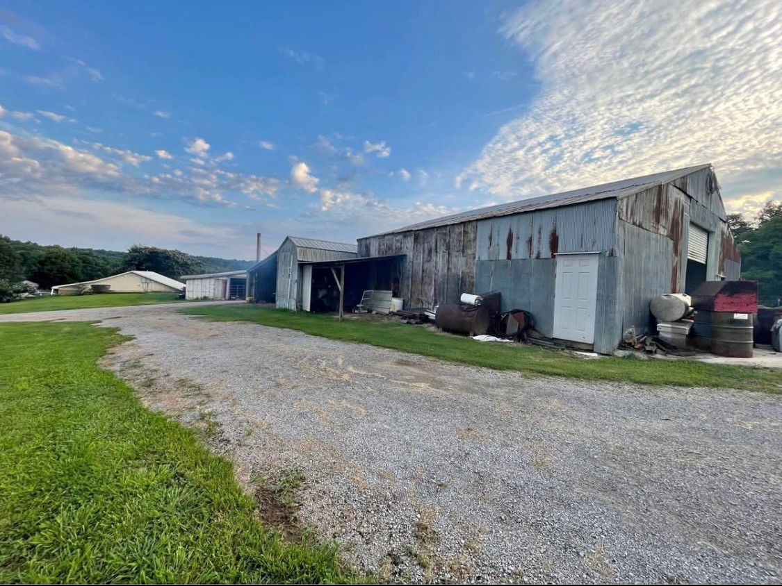 2975 Bethlehem Church Road Mount Hermon, KY 42157 - Photo 68 of 72 a front view of a house with garden