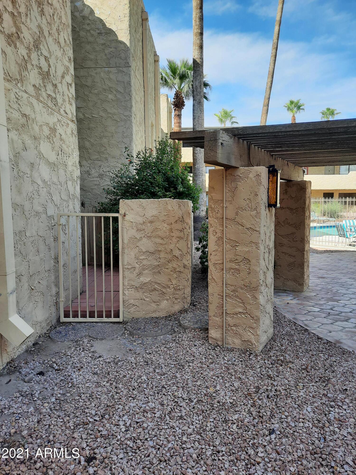 4950 North Miller Road, Unit 147 Scottsdale, AZ 85251 - Photo 17 of 21 Back Patio Exit