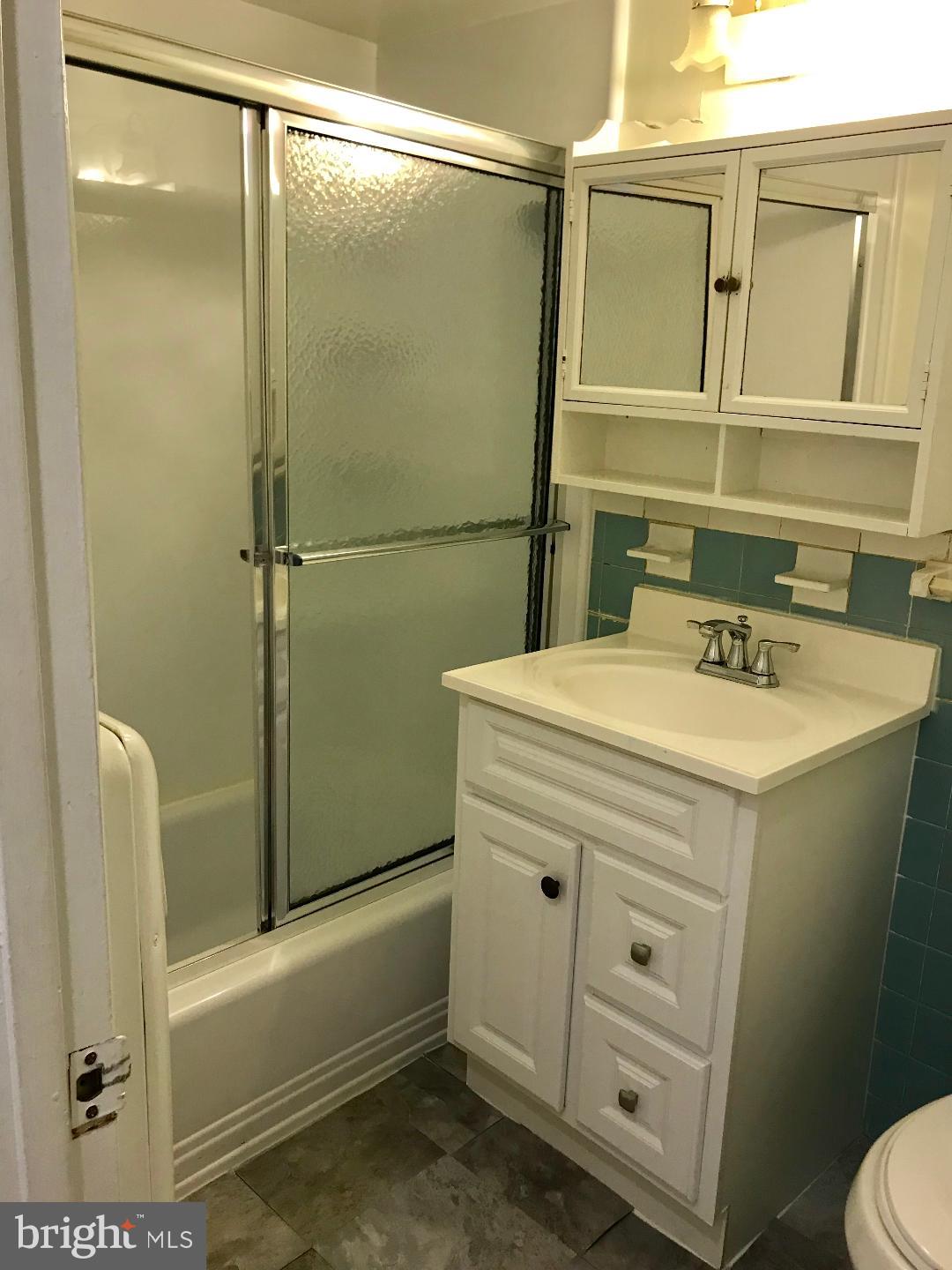 9274 Adelphi Road, Unit 2 Hyattsville, MD 20783 - Photo 14 of 31 BATHROOM HAS TUB SHOWER