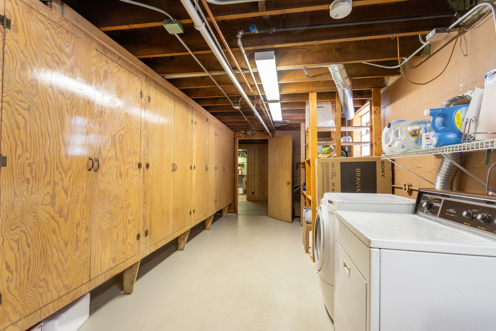 342 Lawton Road Riverside, IL 60546 - Photo 22 of 33 a view of storage and utility room with washer and dryer
