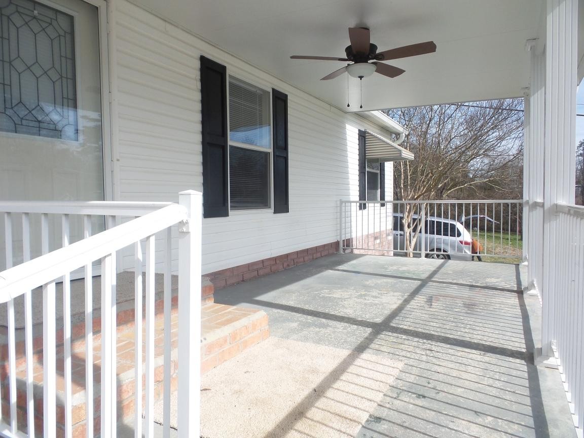 135 King Street Clinton, TN 37716 - Photo 21 of 29 a view of porch with seating space