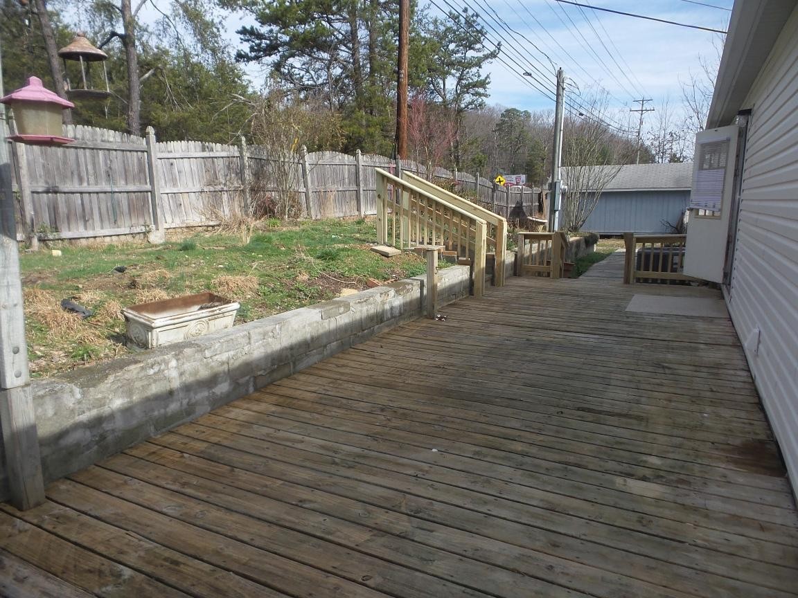 135 King Street Clinton, TN 37716 - Photo 29 of 29 a view of a terrace with wooden floor