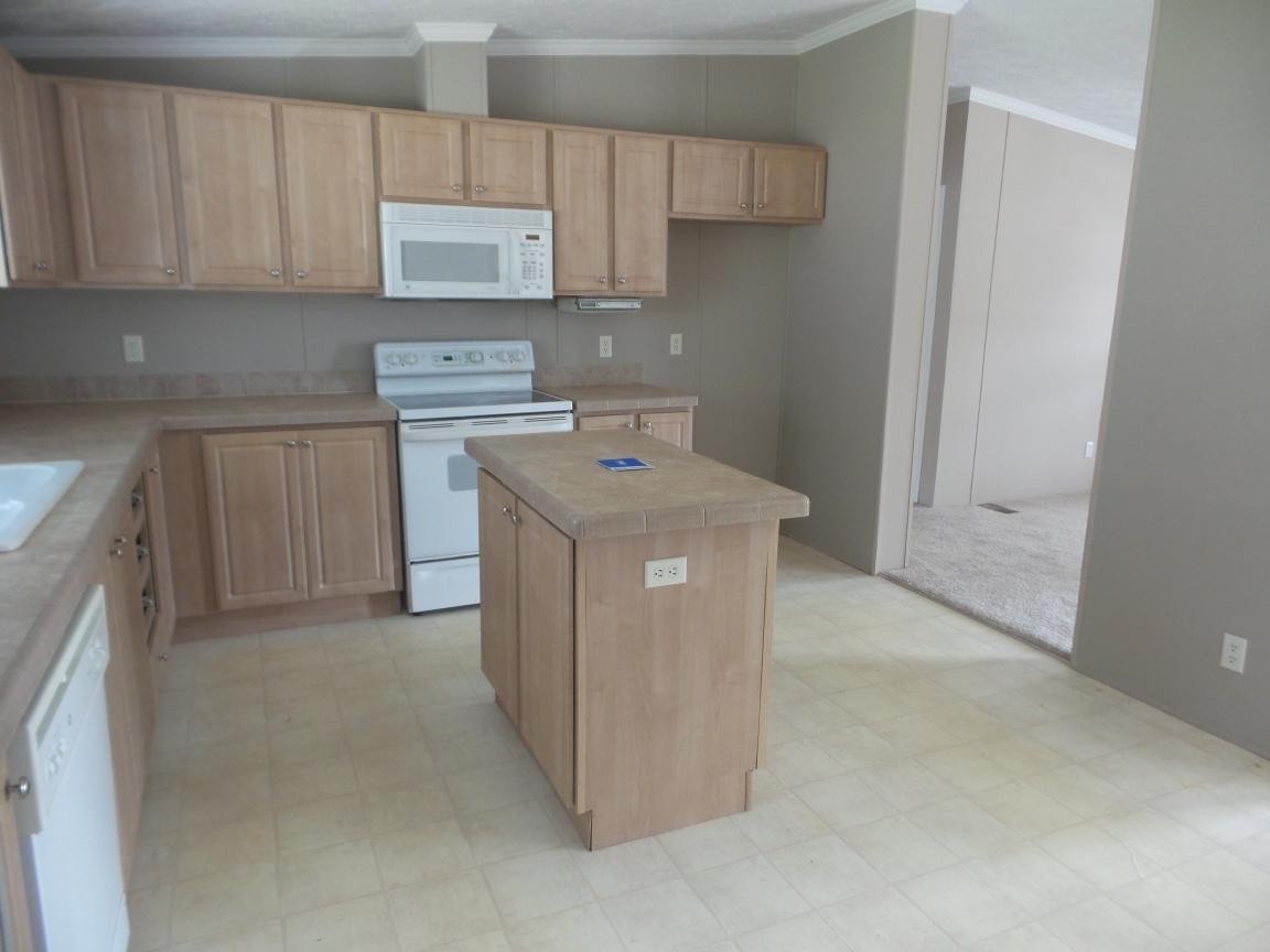 135 King Street Clinton, TN 37716 - Photo 5 of 29 a utility room with sink dryer and washer