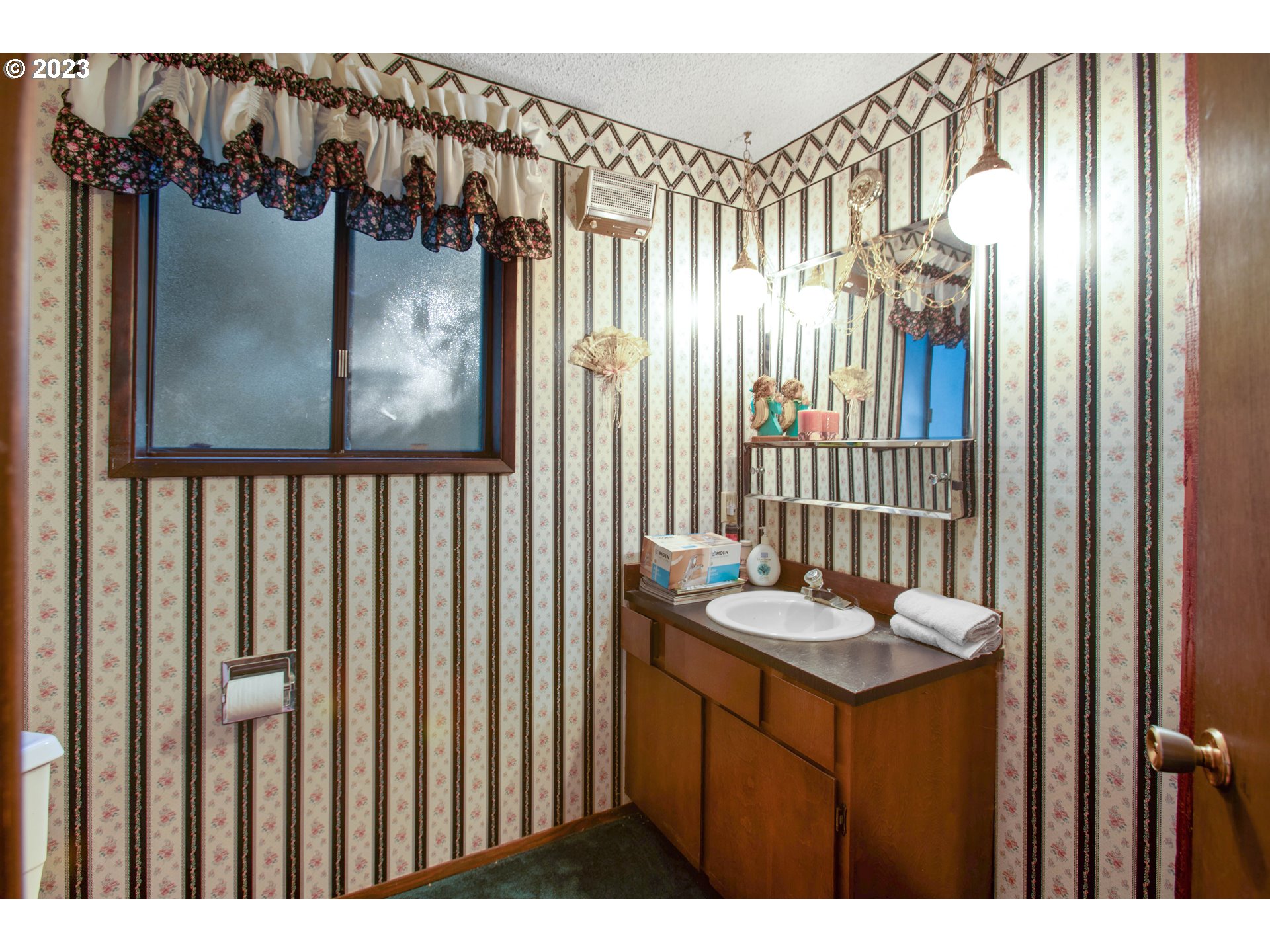 207 Laskey Road Reedsport, OR 97467 - Photo 41 of 48 a bathroom with a granite countertop sink and a mirror