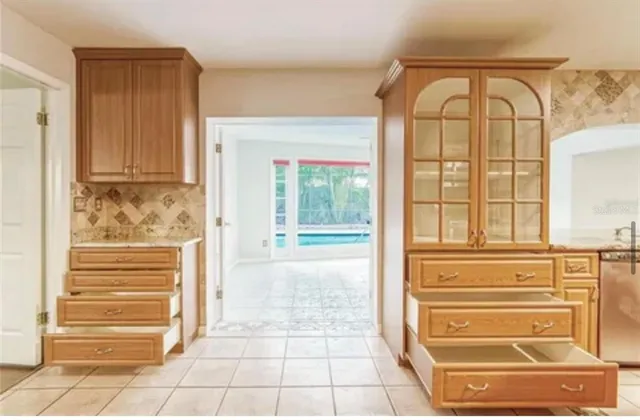 a bathroom with a sink a vanity and a mirror