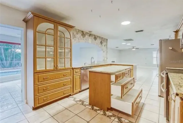 a living room with a couch and a table