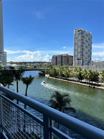 a view of swimming pool from a balcony