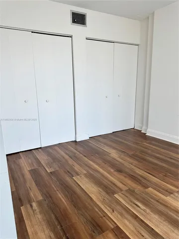 a view of a room with an empty space