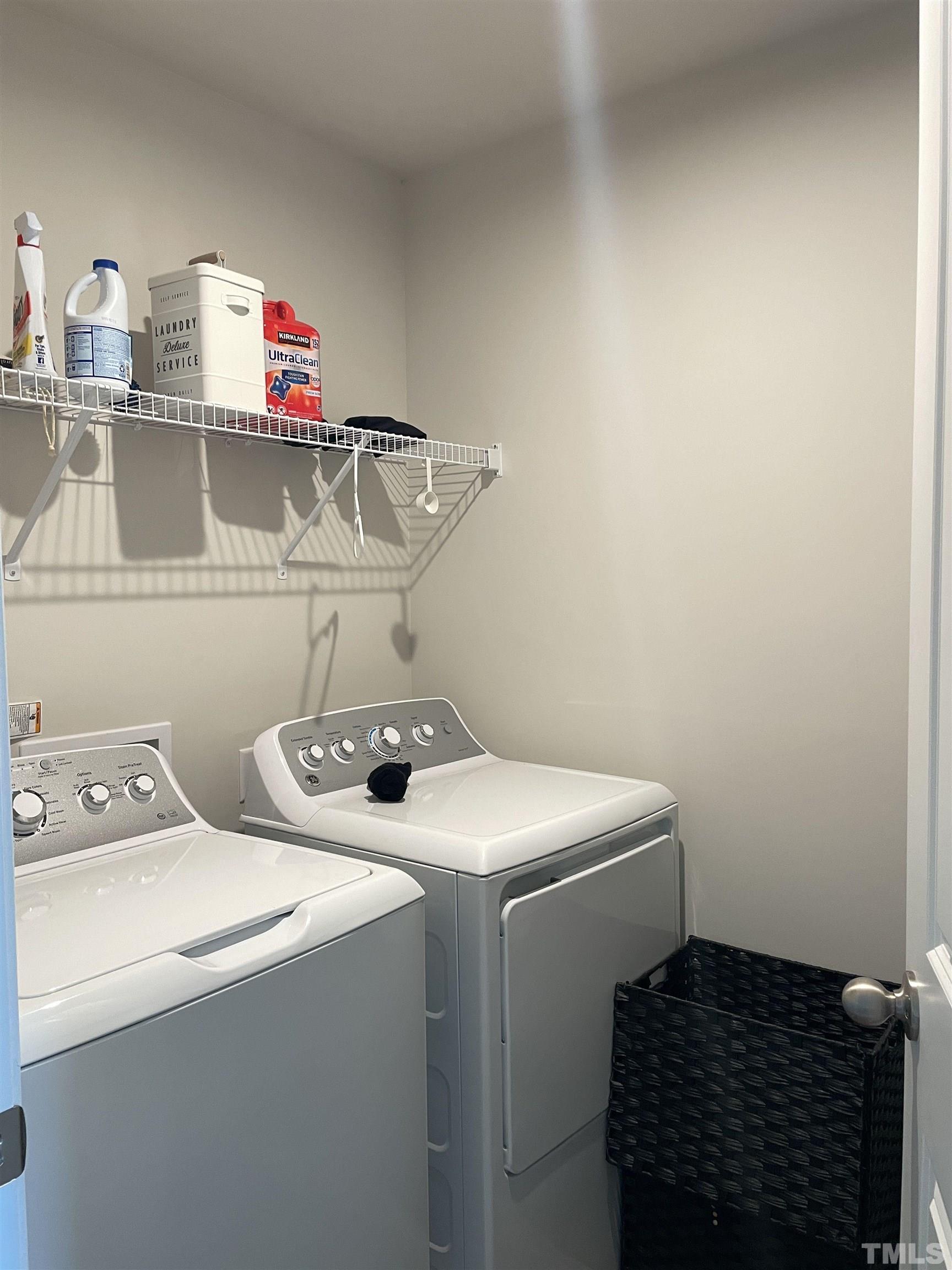 1016 Bent Willow Drive Durham, NC 27704 - Photo 19 of 20 a utility room with dryer and washer