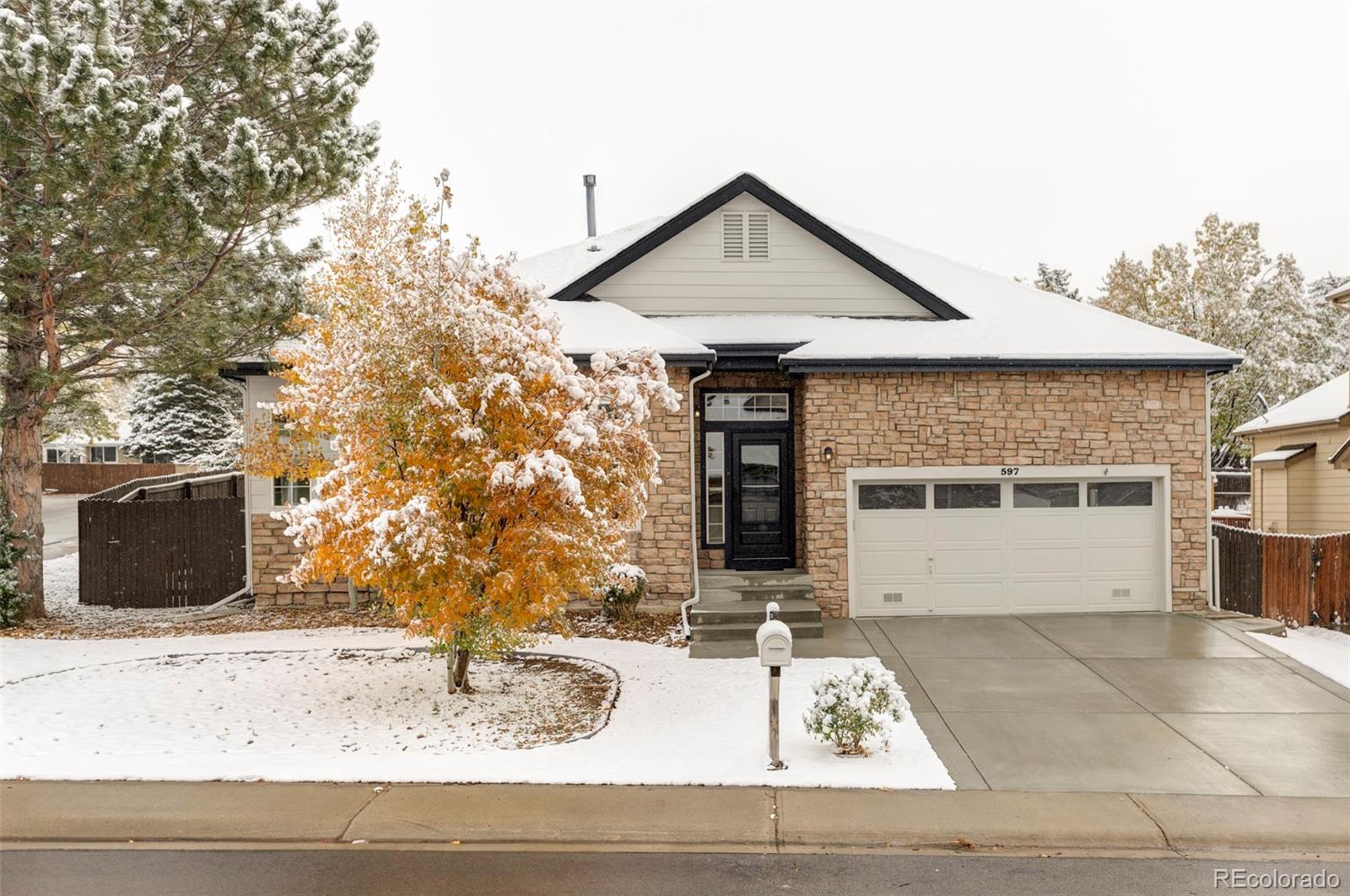 597 Rider Ridge Drive Longmont, CO 80504 - Photo 1 of 31 a front view of a house with entertaining space