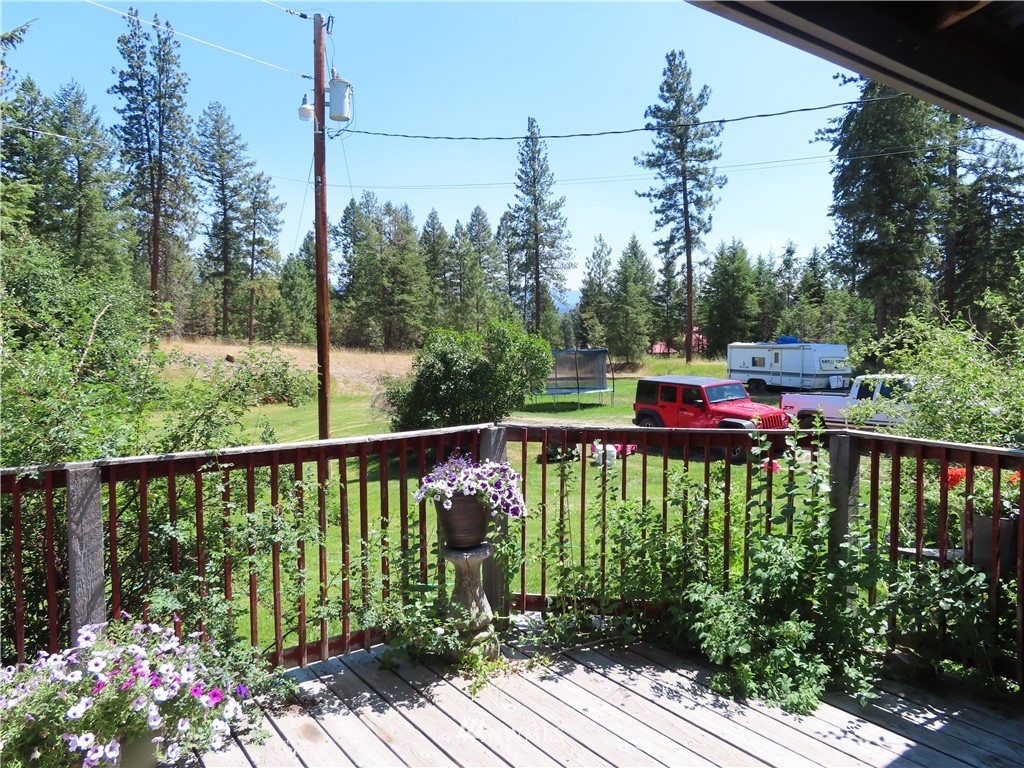 347 West Curlew Lake Road Republic, WA 99166 - Photo 18 of 26 a view of a balcony with chairs
